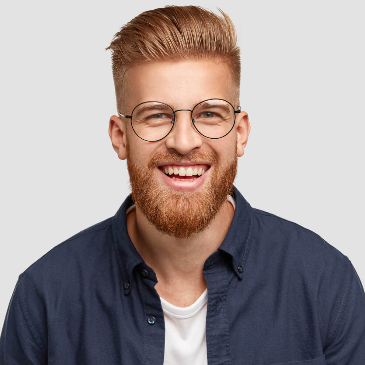 Home pleased cheerful redhaired male with pleasant smil ccxayzl.jpg